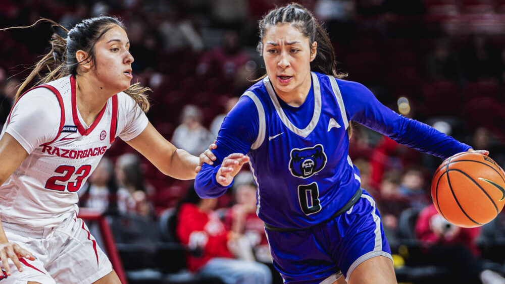 Sugar Bears Jade Upshaw drives against Arkansas