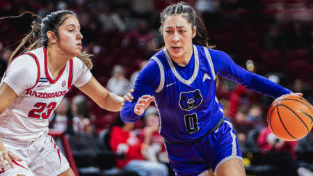 Sugar Bears Jade Upshaw drives against Arkansas