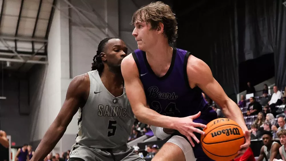 UCA's Cole McCormick drives against Jacksonville