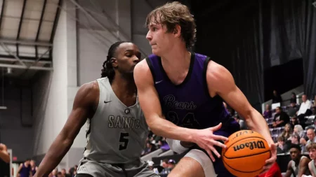 UCA's Cole McCormick drives against Jacksonville
