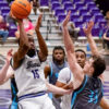 UCA Bears forward Michael Evbagharu puts up a shot inside against North Florida