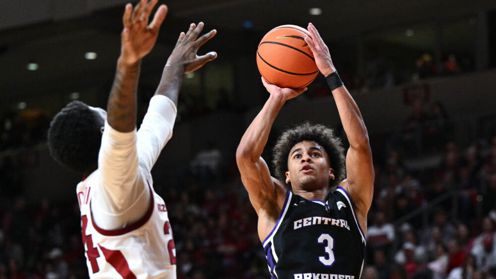 UCA Bears Brayden Fagbemi puts up a shot as Arkansas Razorbacks Billy Richmond defends