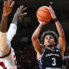 UCA Bears Brayden Fagbemi puts up a shot as Arkansas Razorbacks Billy Richmond defends